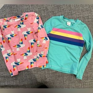 Hanna Andersson pink bird rashguard size 130 and teal rainbow size 120 bundle